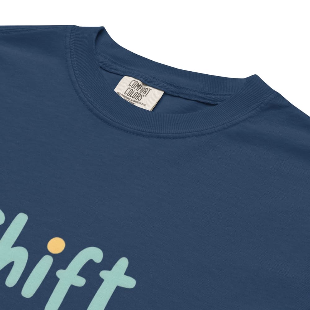 “Shift Happens – Nurse Edition” pastel text design printed on a thick garment-dyed cotton t-shirt, perfect for nurses and healthcare professionals with a sense of humor.