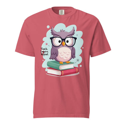 Cute purple owl with glasses sitting on stacked books, with quote "Teach. Inspire. Repeat." – printed on a teacher t-shirt