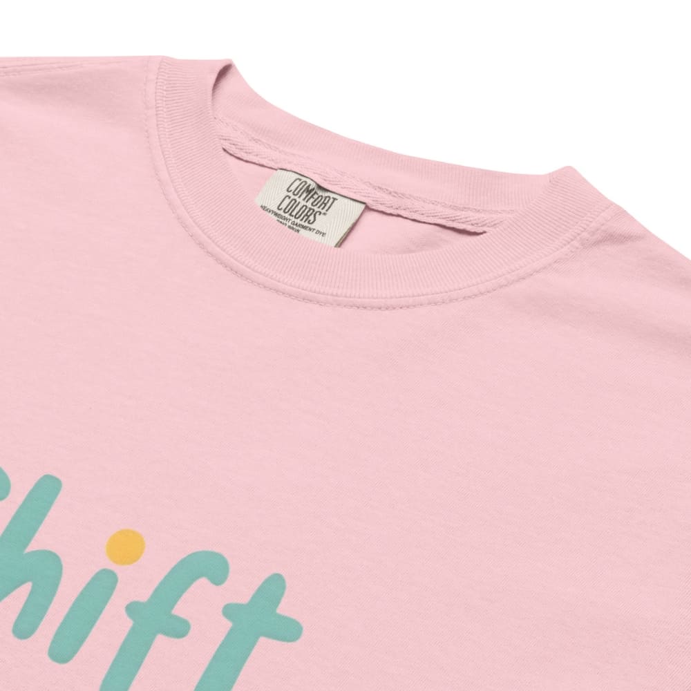 “Shift Happens – Nurse Edition” pastel text design printed on a thick garment-dyed cotton t-shirt, perfect for nurses and healthcare professionals with a sense of humor.