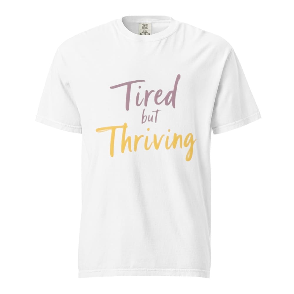 Garment-dyed relaxed fit t-shirt with motivational quote “Tired But Thriving” in modern handwritten script