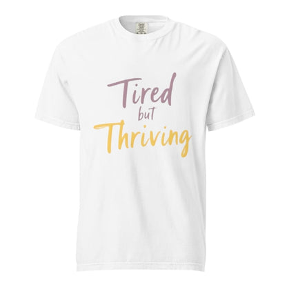 Garment-dyed relaxed fit t-shirt with motivational quote “Tired But Thriving” in modern handwritten script