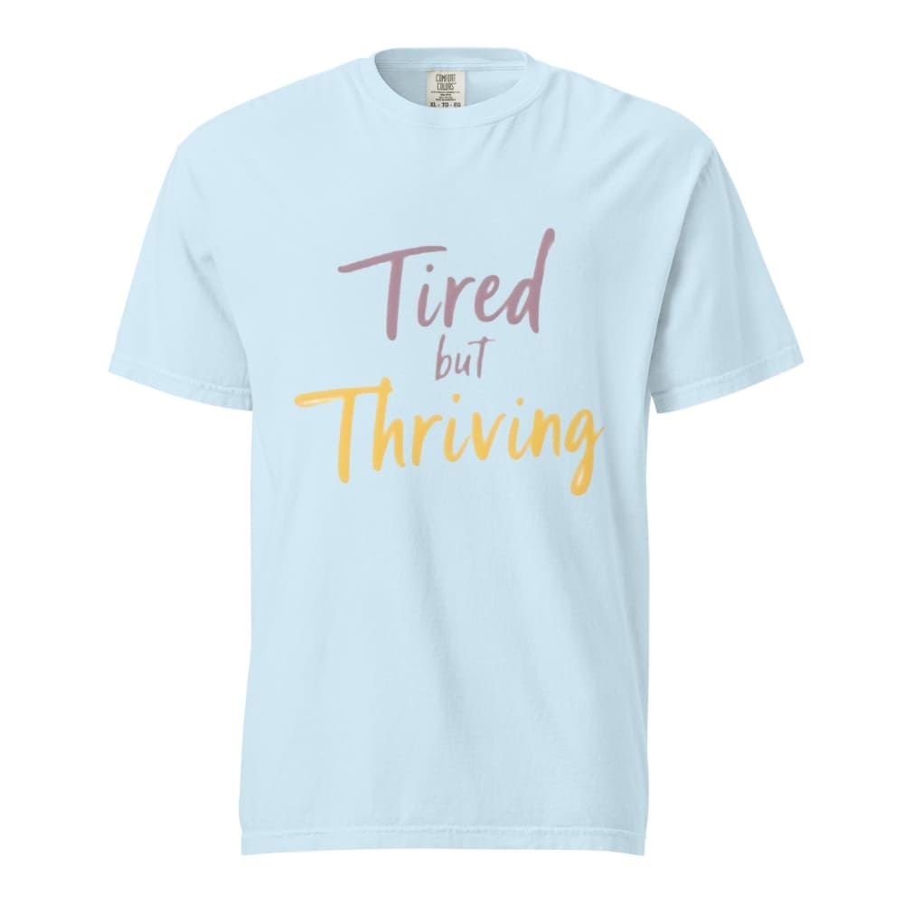Garment-dyed relaxed fit t-shirt with motivational quote “Tired But Thriving” in modern handwritten script