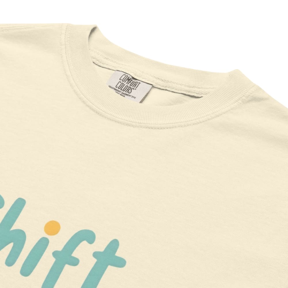 “Shift Happens – Nurse Edition” pastel text design printed on a thick garment-dyed cotton t-shirt, perfect for nurses and healthcare professionals with a sense of humor.