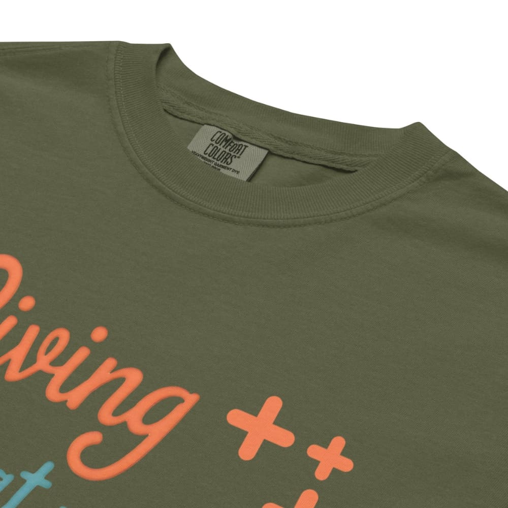 “Living That Scrub Life” colorful text printed on a garment-dyed cotton t-shirt for nurses and healthcare professionals