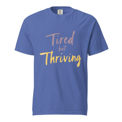 Garment-dyed relaxed fit t-shirt with motivational quote “Tired But Thriving” in modern handwritten script