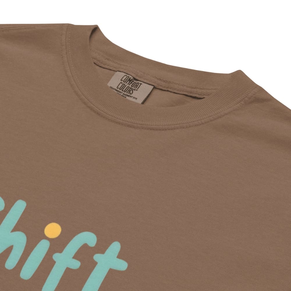 “Shift Happens – Nurse Edition” pastel text design printed on a thick garment-dyed cotton t-shirt, perfect for nurses and healthcare professionals with a sense of humor.