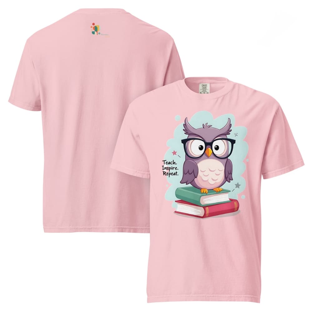 Cute purple owl with glasses sitting on stacked books, with quote "Teach. Inspire. Repeat." – printed on a teacher t-shirt
