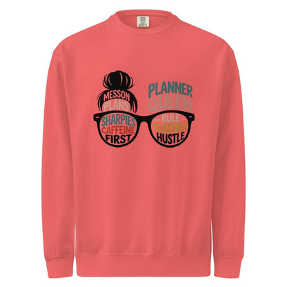 Coral sweatshirt with graphic design and text on a white background