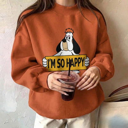 Person wearing an orange sweatshirt with a cartoon character and 'I'm so happy' text, holding a drink.
