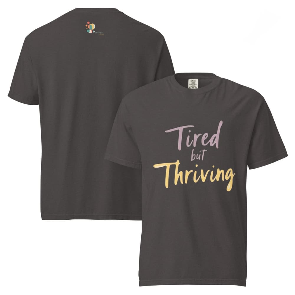 Garment-dyed relaxed fit t-shirt with motivational quote “Tired But Thriving” in modern handwritten script