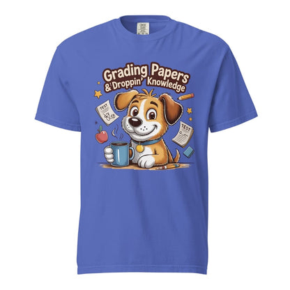 Cartoon teacher dog with coffee mug, papers, and pencil surrounded by stars with the quote "Grading Papers & Droppin’ Knowledge"