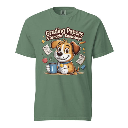 Cartoon teacher dog with coffee mug, papers, and pencil surrounded by stars with the quote "Grading Papers & Droppin’ Knowledge"