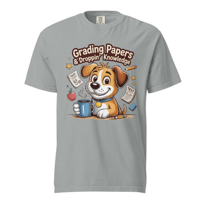Cartoon teacher dog with coffee mug, papers, and pencil surrounded by stars with the quote "Grading Papers & Droppin’ Knowledge"