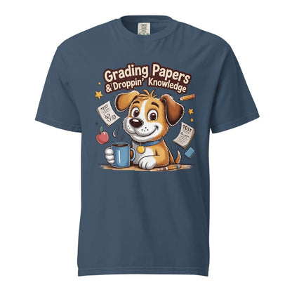 Cartoon teacher dog with coffee mug, papers, and pencil surrounded by stars with the quote "Grading Papers & Droppin’ Knowledge"