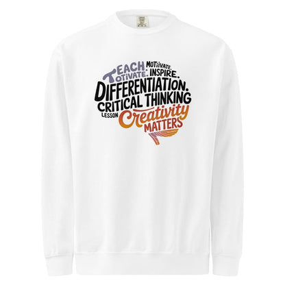 White long-sleeve shirt with motivational text design on a white background