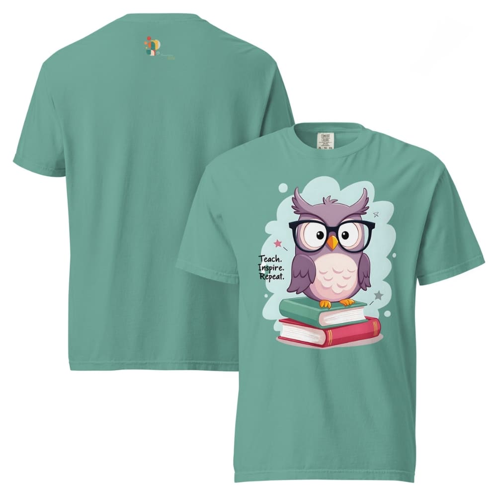 Cute purple owl with glasses sitting on stacked books, with quote "Teach. Inspire. Repeat." – printed on a teacher t-shirt