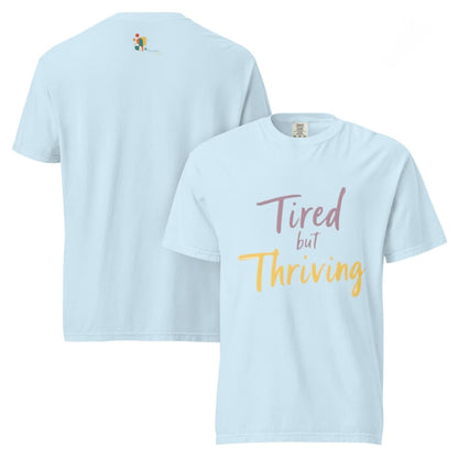 Garment-dyed relaxed fit t-shirt with motivational quote “Tired But Thriving” in modern handwritten script