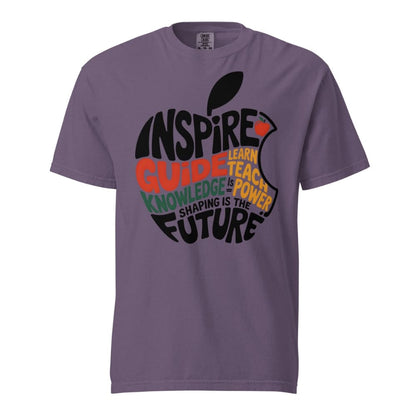 Purple t-shirt with an apple design and motivational text on a white background
