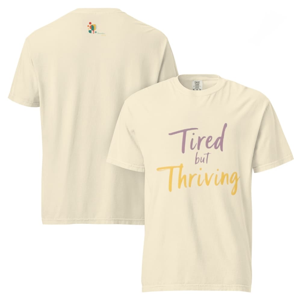 Garment-dyed relaxed fit t-shirt with motivational quote “Tired But Thriving” in modern handwritten script