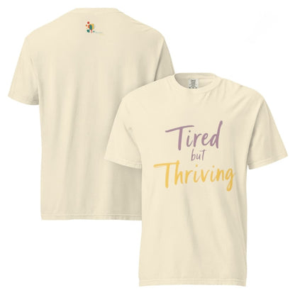 Garment-dyed relaxed fit t-shirt with motivational quote “Tired But Thriving” in modern handwritten script