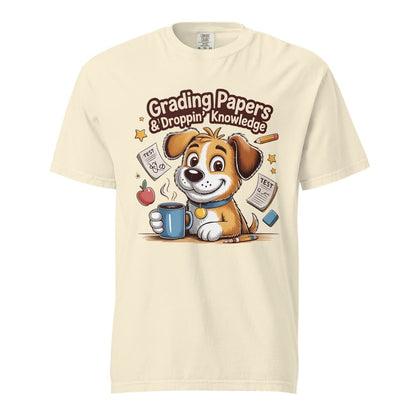 Cartoon teacher dog with coffee mug, papers, and pencil surrounded by stars with the quote "Grading Papers & Droppin’ Knowledge"