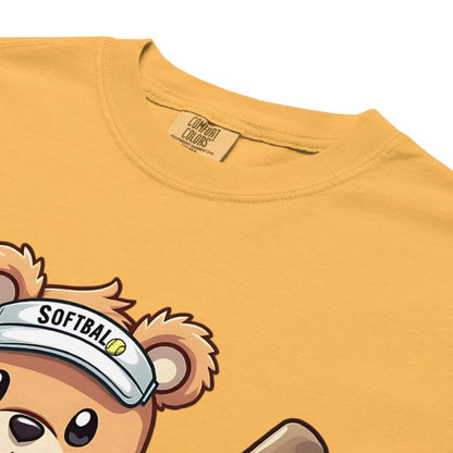 Cartoon bear holding softball bats and ball wearing a visor labeled “Softball” – printed on garment-dyed heavyweight t-shirt for sporty moms