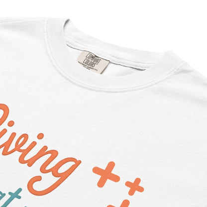 “Living That Scrub Life” colorful text printed on a garment-dyed cotton t-shirt for nurses and healthcare professionals
