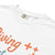“Living That Scrub Life” colorful text printed on a garment-dyed cotton t-shirt for nurses and healthcare professionals