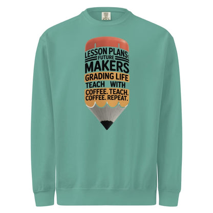 Teal sweatshirt with a graphic of a pencil and text on a white background