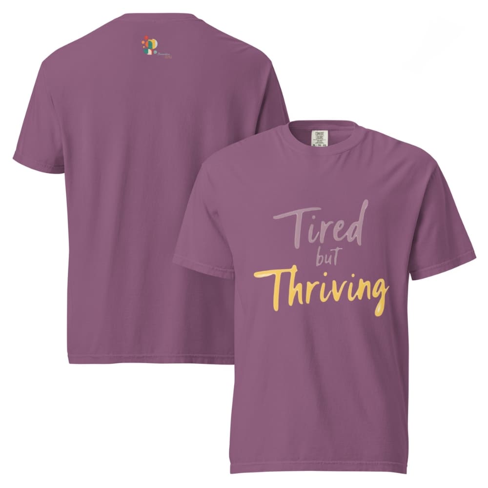 Garment-dyed relaxed fit t-shirt with motivational quote “Tired But Thriving” in modern handwritten script