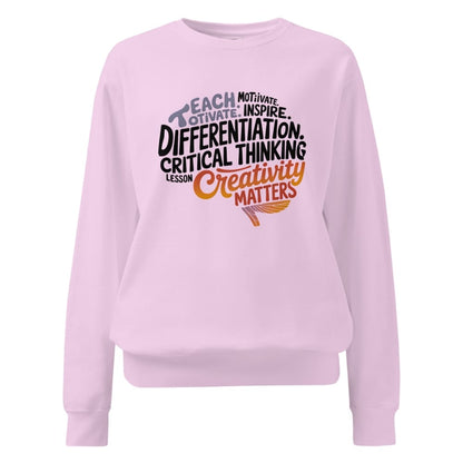 Pink sweatshirt with motivational text design on a white background