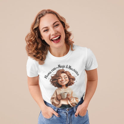 Woman wearing a white t-shirt with a graphic design and text, smiling against a beige background