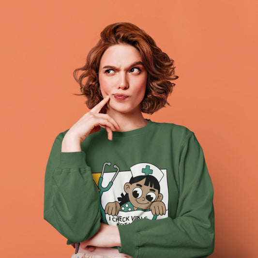 Woman wearing a green sweatshirt with a cartoon character on an orange background