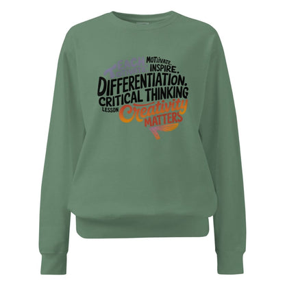 Green sweatshirt with motivational text on a white background