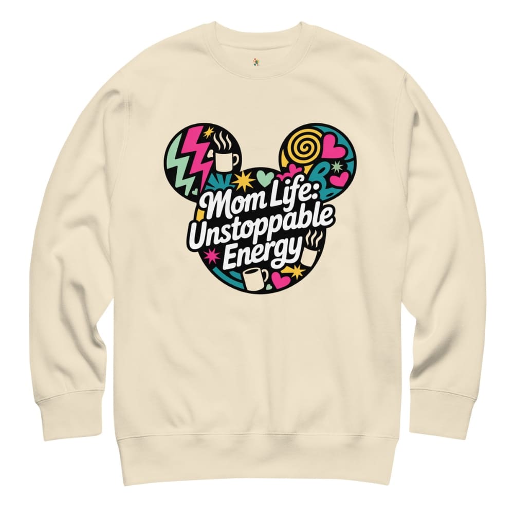 Beige sweatshirt with colorful graphic and text 'Mom Life: Unstoppable Energy' on a white background