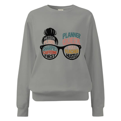 Gray sweatshirt with graphic design and text on a white background