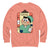 Peach-colored sweatshirt with a cartoon character and text on a white background
