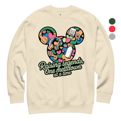 Beige sweatshirt with colorful graphic and text on a white background