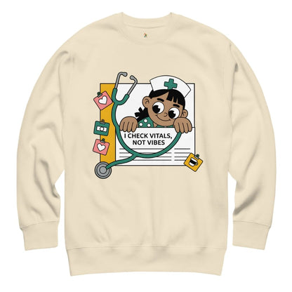 Beige sweatshirt with a cartoon character holding a stethoscope and text on a white background