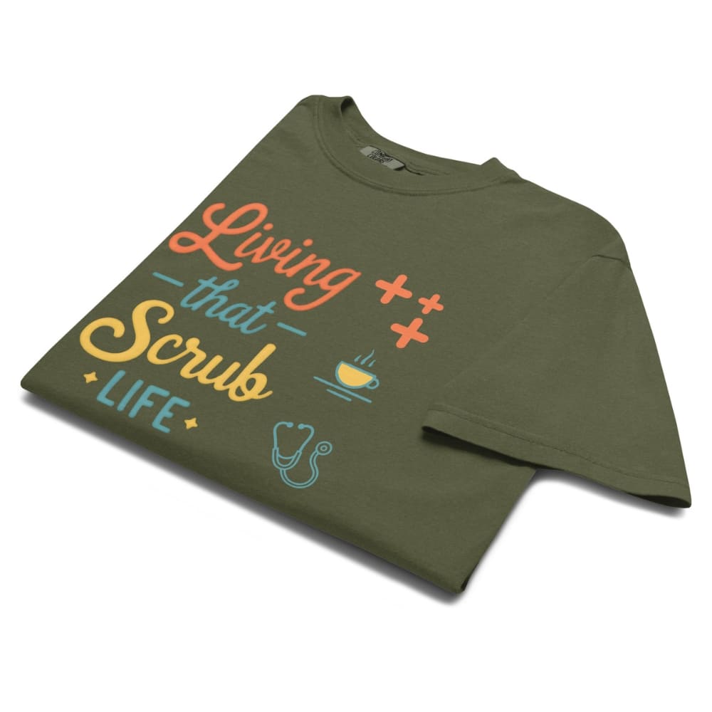 “Living That Scrub Life” colorful text printed on a garment-dyed cotton t-shirt for nurses and healthcare professionals