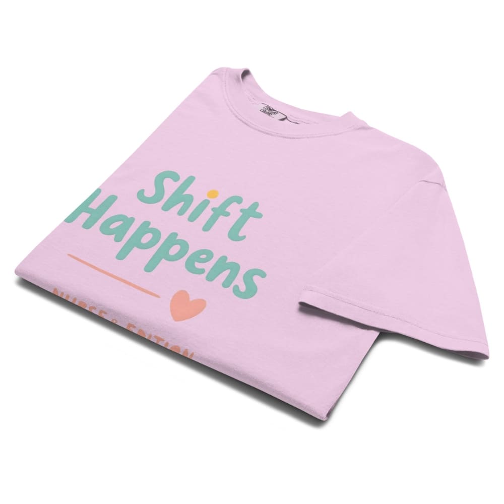 “Shift Happens – Nurse Edition” pastel text design printed on a thick garment-dyed cotton t-shirt, perfect for nurses and healthcare professionals with a sense of humor.