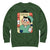 Green sweatshirt with a cartoon character and text on a white background