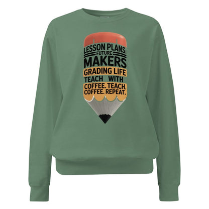 Green sweatshirt with a pencil graphic and text on a white background