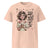 Peach t-shirt with a graphic of a woman holding a mug and text on a white background
