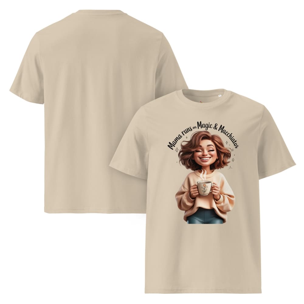 Beige t-shirt with a graphic of a woman holding a coffee cup and text 'Mama runs the magic & macchiatos' on a white background.