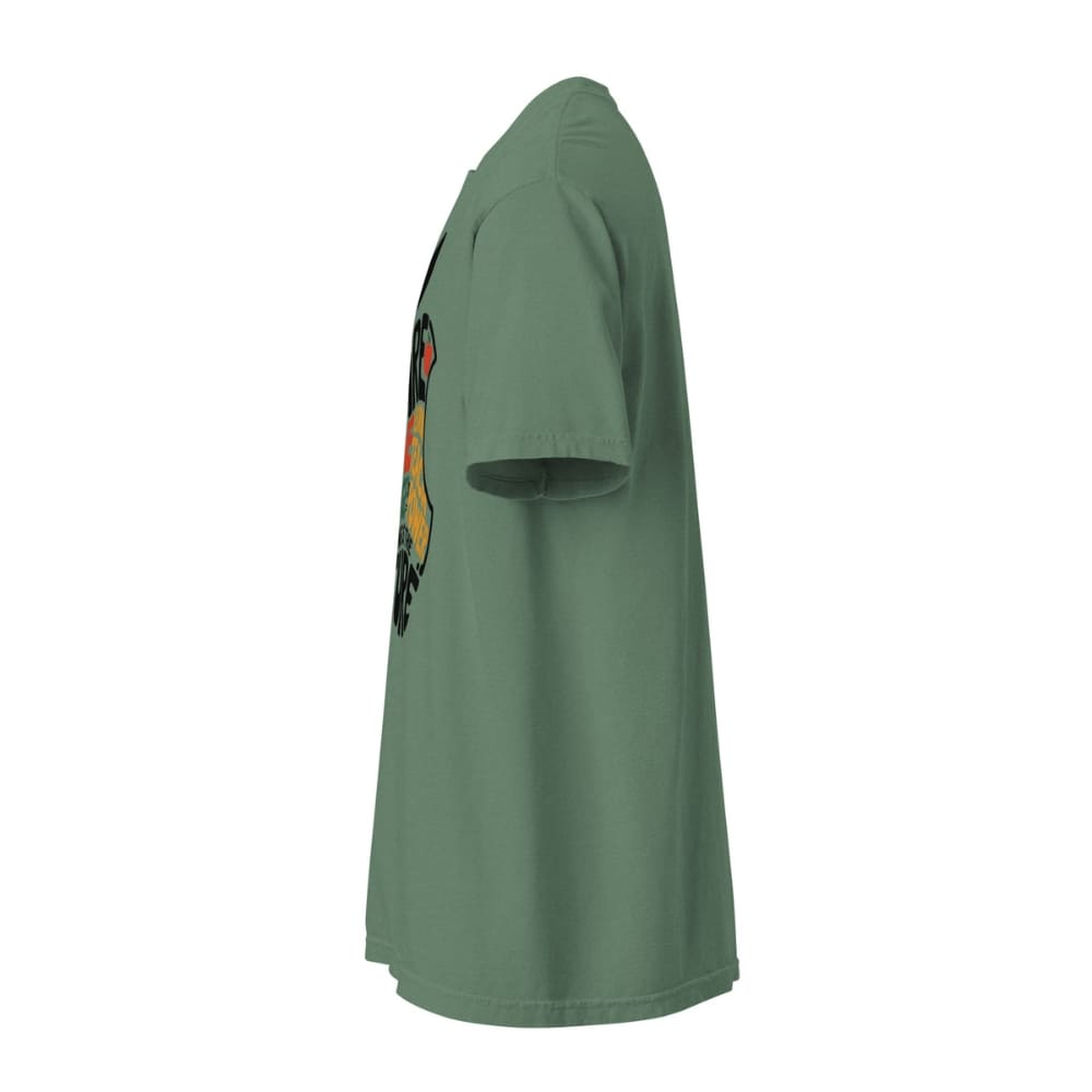 Green t-shirt with a colorful graphic on the sleeve against a white background