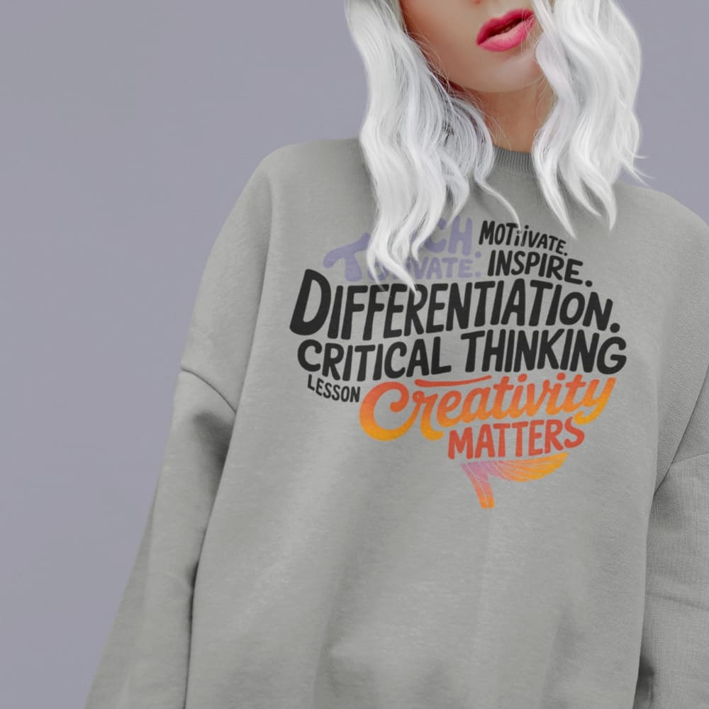 Gray sweatshirt with motivational text on a plain background