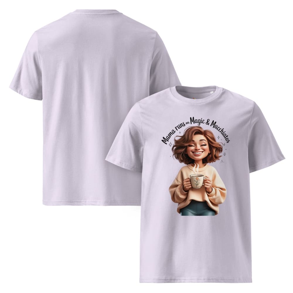 White t-shirt with a graphic of a woman holding a mug and text 'Mama runs the Magic & Macarons' on a white background.