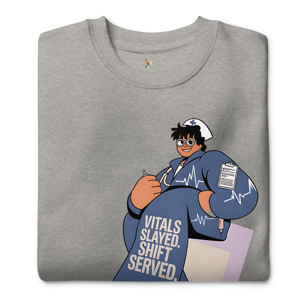 Gray t-shirt with a cartoon character in a nurse's outfit and text 'Vitals Slaved, Shift Served' on a white background