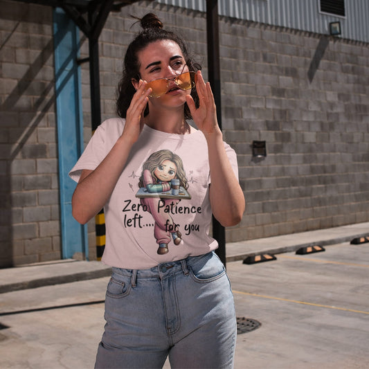 Woman wearing a t-shirt with a graphic design and text, standing outdoors.